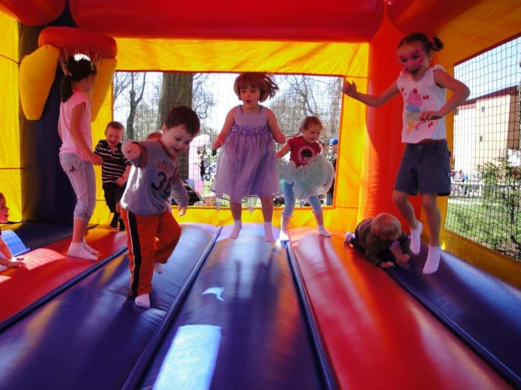 Kids jumping in bounce house